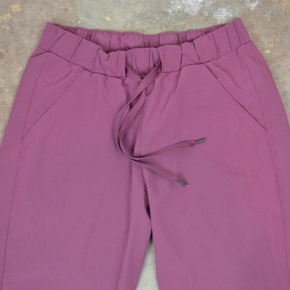Under Armour Woven Ankle Crop Lightweight Pants, Size Small Magenta 1329473 - Picture 4 of 11